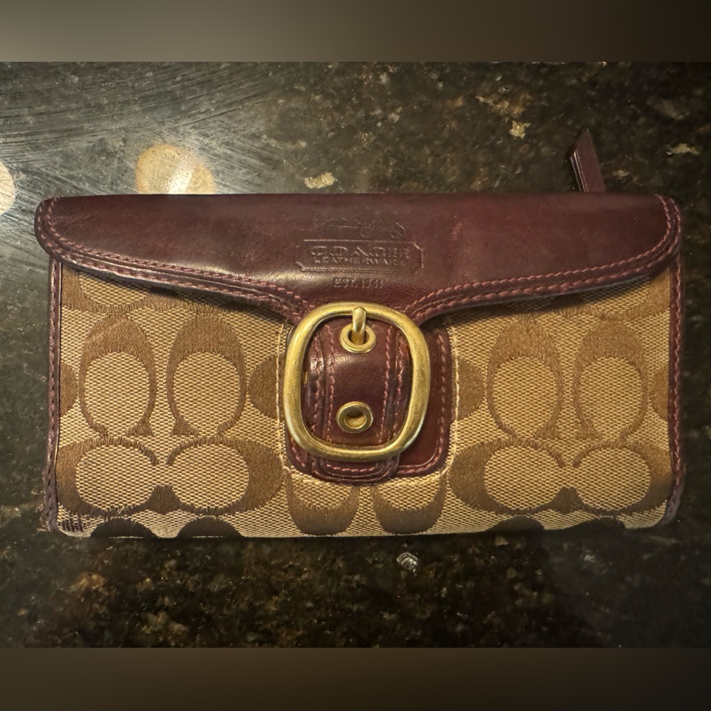 Plum coach wallet
